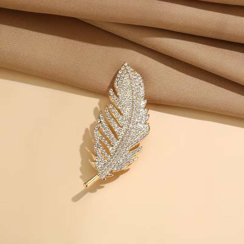 Free gift – vintage golden feather brooch included with every order