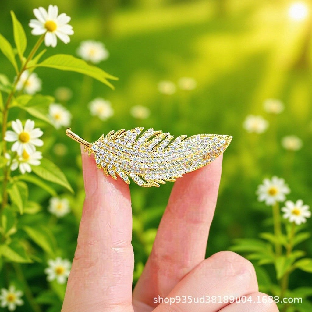 Free gift – vintage golden feather brooch included with every order